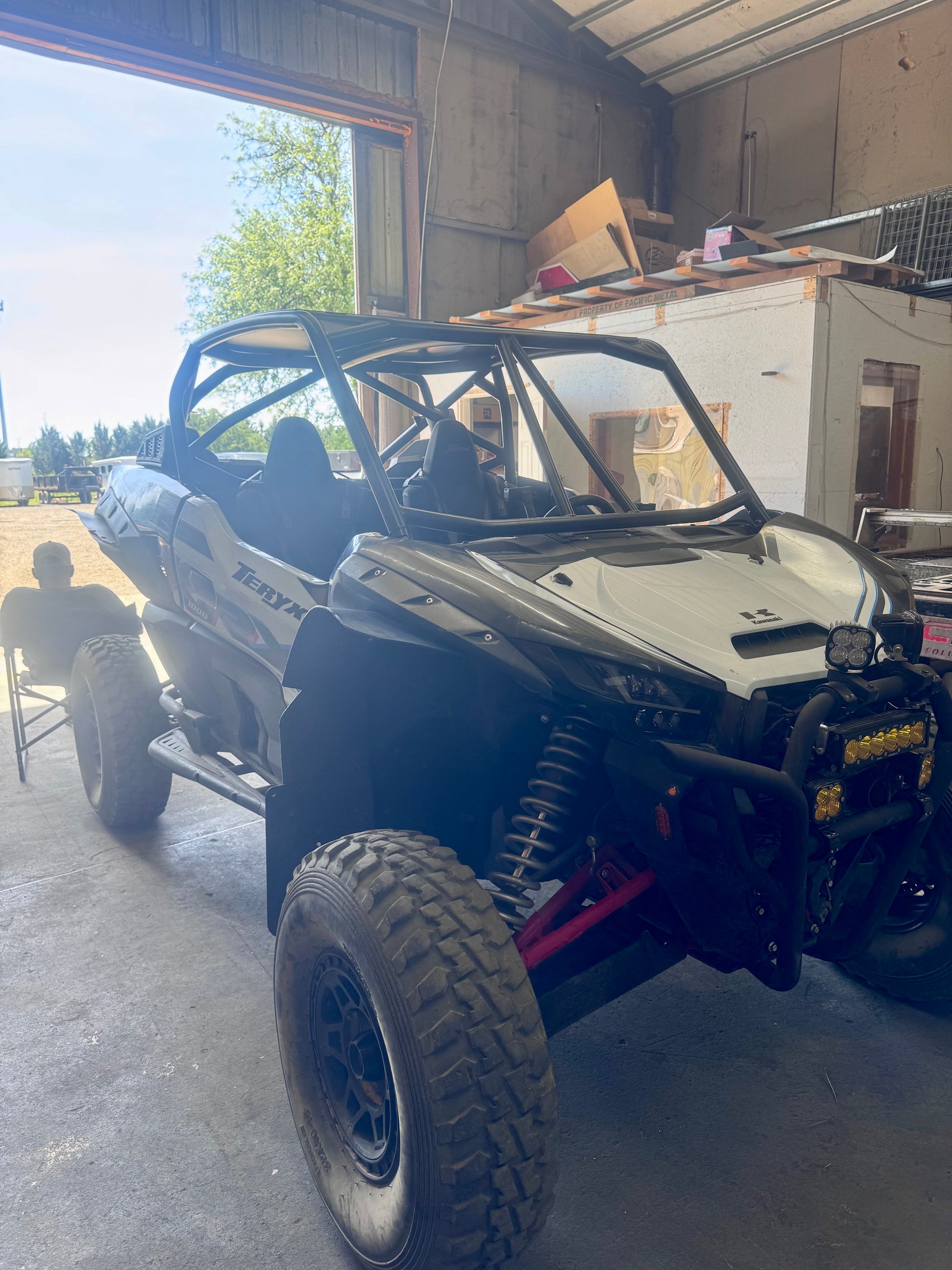 kawasaki krx side by side roll cage installed in harrisburg oregon inside fabrication shop