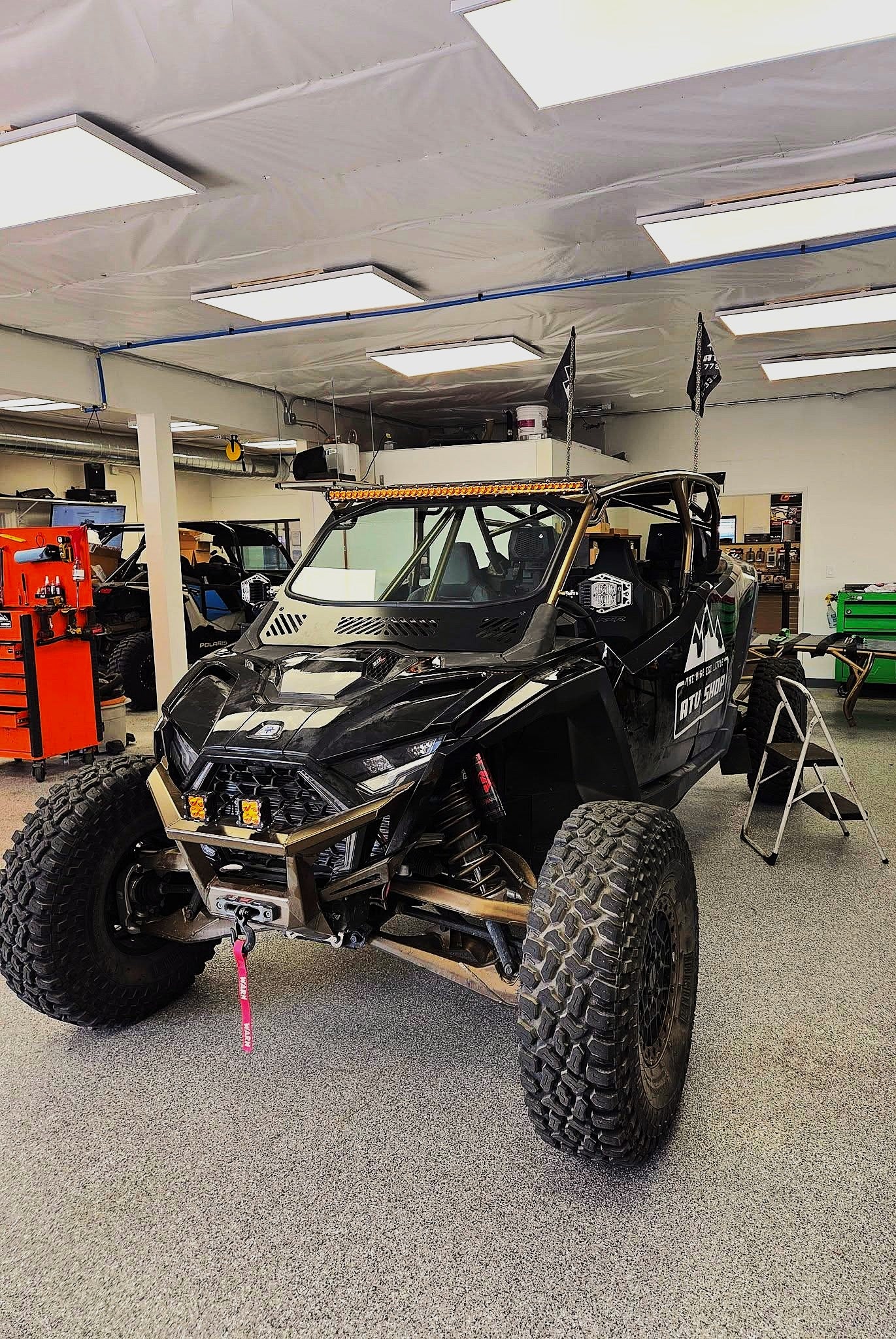 Polaris Pro R 4 with WCI Off-Road Pro R 4 cage and windshield